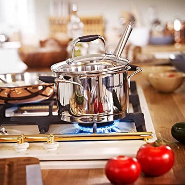 سرویس قابلمه 8 پارچه استیل براق فلورا کرکماز 1979