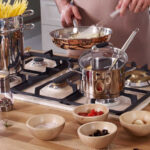 سرویس قابلمه 8 پارچه استیل براق فلورا کرکماز 1979