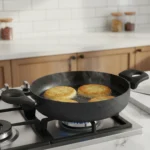 قابلمه کوتاه نچسب 24*6 سانتی متر 2.2 لیتر مشکی منچستر ریوالد 6504124-0411 | رابیما